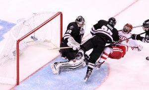 Danny O'Regan gets knocked down.  PHOTO BY MAYA DEVEREAUX/DAILY FREE PRESS STAFF