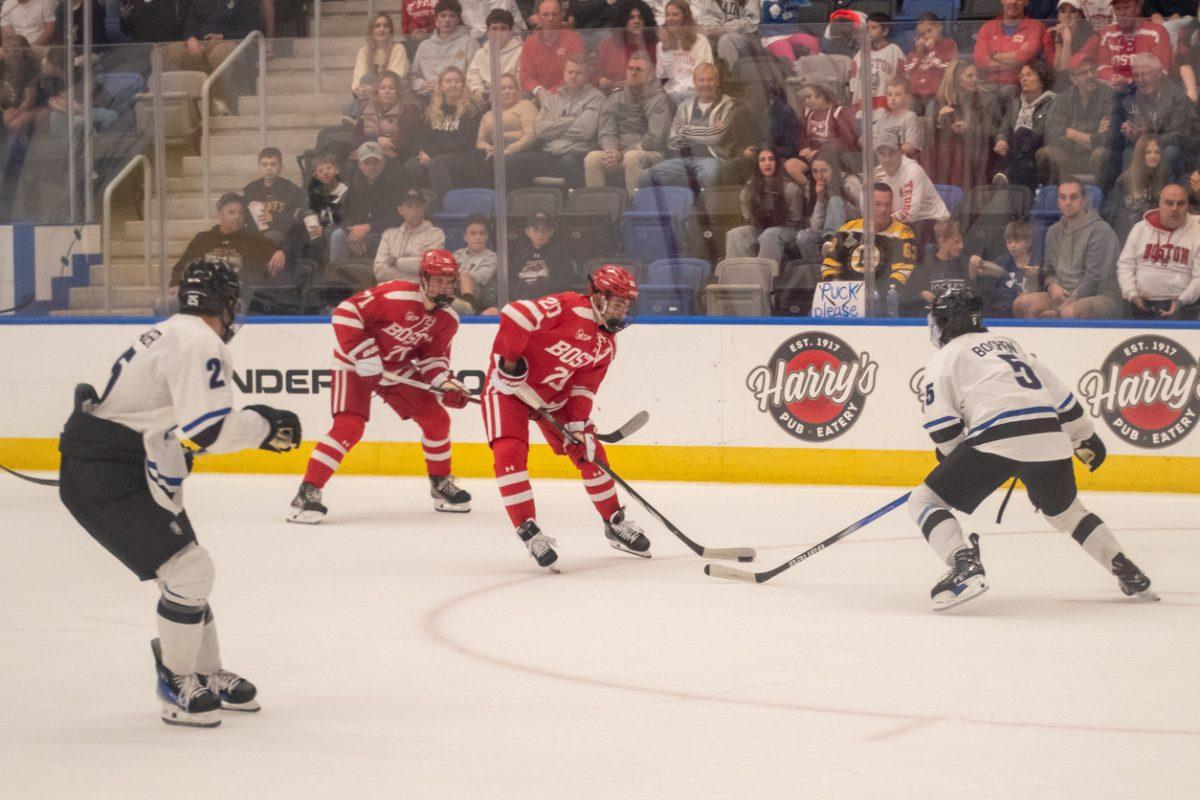 Lane Hutson in BU's season opener at Bentley. Photo by Molly Potter.