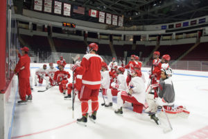 The Terriers watch BU head coach David Quinn during practice. PHOTO BY CHLOE GRINBERG/ DAILY FREE PRESS STAFF
