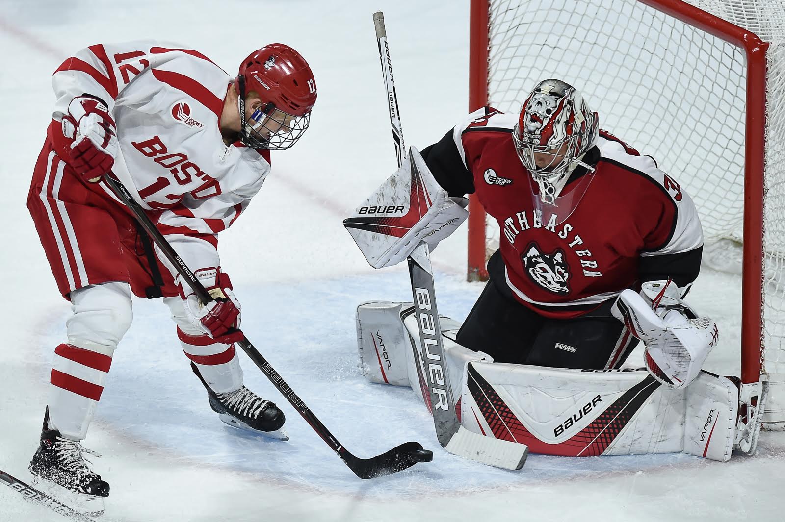Senior forward Chase Phelps in front of the net against Northeastern University. PHOTO BY MADDIE MALHOTRA/ DAILY FREE PRESS STAFF