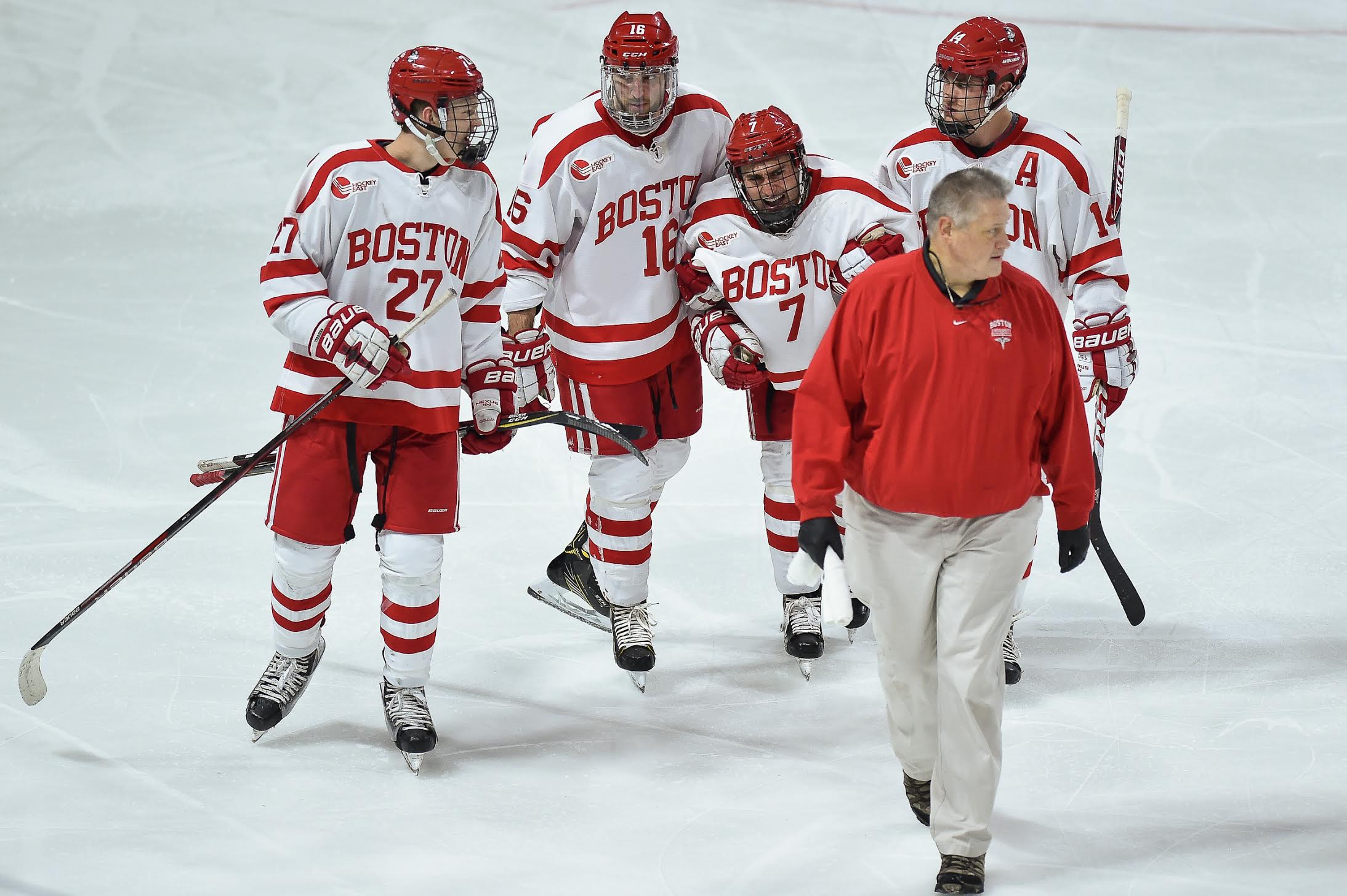 Chad Krys was helped off the ice, but returned back to the BU bench quickly. PHOTO BY MADDIE MALHOTRA/ DAILY FREE PRESS STAFF